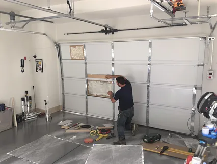 Garage Door Panel Repair in Copley