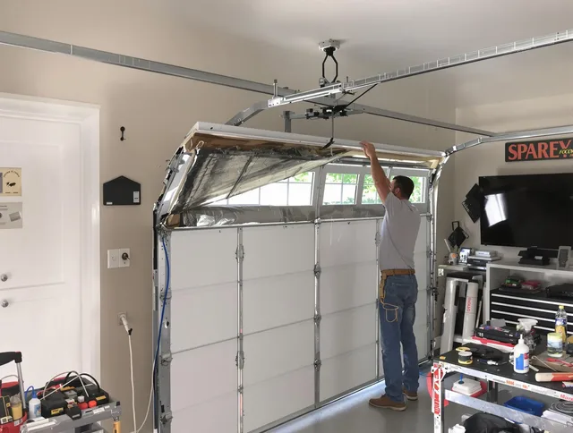 Garage door section replacement by Copley Garage Door Repair in Copley