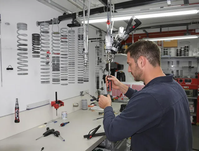 Copley Garage Door Repair safety certified technician performing precision spring replacement in Copley