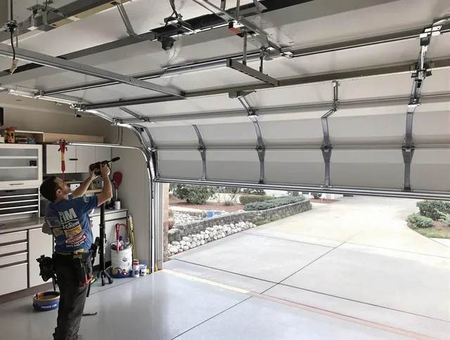 Garage door track repair service by Copley Garage Door Repair in Copley